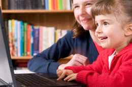 Child learning with Ultimate Phonics computer software program Child learning with Ultimate Phonics computer software program
