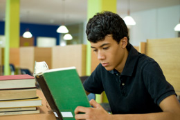 Teenager reading book Teenager reading book